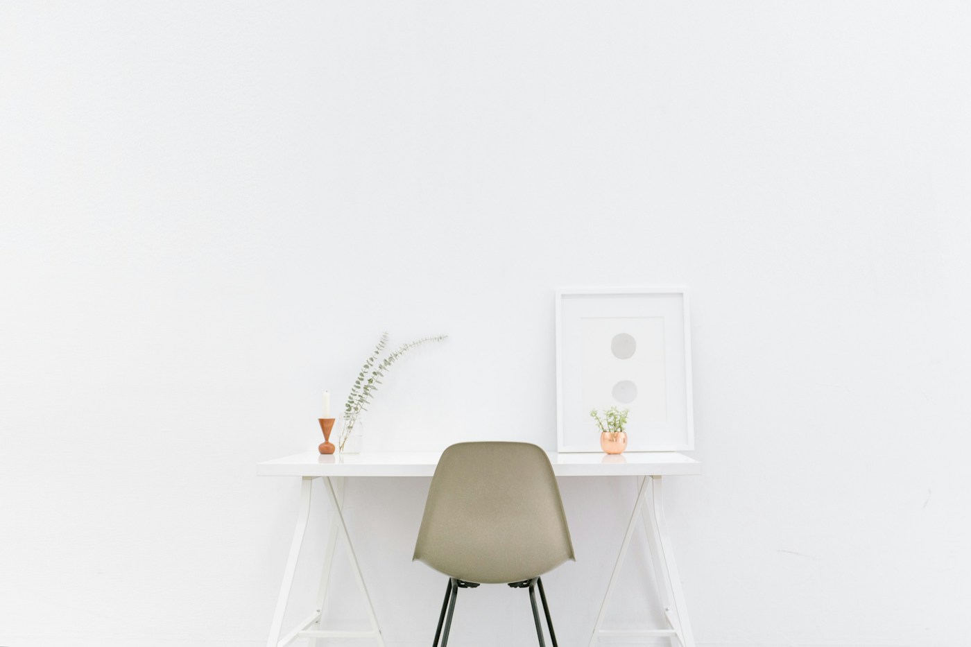 A light-filled home with plants, simple furniture and natural textures